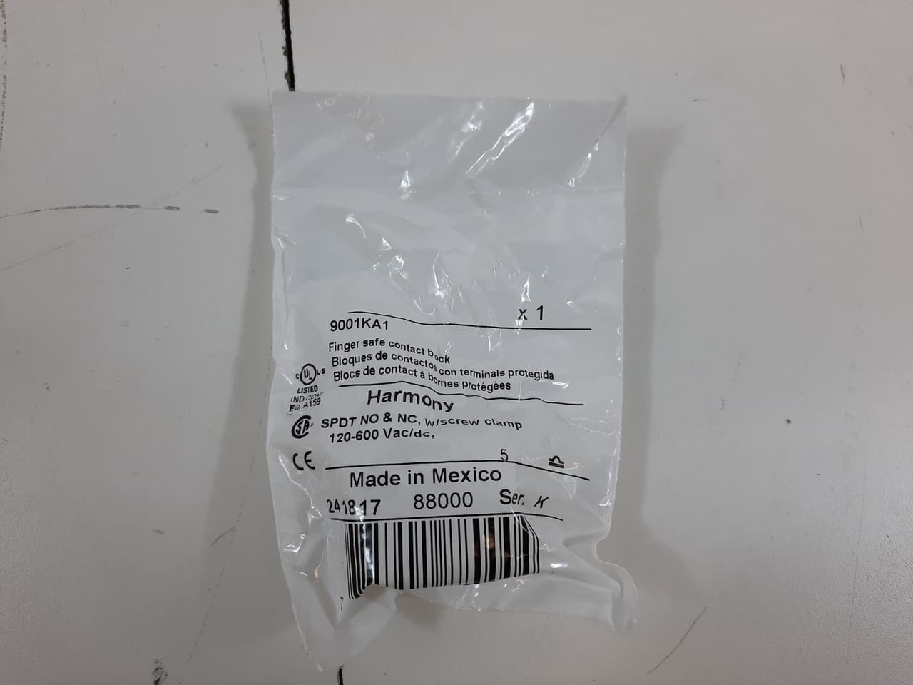 Schneider Electric 9001KA1 Schneider Electric 9001KA1 is a contacts block designed with a contact block featuring direct-acting contacts, including 1 Normally Open (NO) auxiliary contact and 1 Normally Closed (NC) contact. It is rated for IP66 and complies with NEMA ratings 1, 2, 3, 3R, 4, 12, and 13, ensuring a wide range of environmental protection. The net height of the contacts block is specified at 2.5 kV, with a power consumption characterized as clear. It has a response time associated with 1 NC contact and is designed for a diameter of 600 V. The network frequency is identified as 9001K. This product is replaced by a version with contacts made of Silver alloy (Ag / Ni) to ensure durability and conductivity. The trip unit type is a screw-clamp mechanism, and the earthing system supports an (Ith) of 10 A. For control circuits, it is rated at AC-15 3 A for 240Vac and DC-13 0.55 A for 125Vdc. The weight of the part is specified. Schneider Electric 9001KA1 Schneider Electric 9001KA1 is a contacts block designed with a contact block featuring direct-acting contacts, including 1 Normally Open (NO) auxiliary contact and 1 Normally Closed (NC) contact. It is rated for IP66 and complies with NEMA ratings 1, 2, 3, 3R, 4, 12, and 13, ensuring a wide range of environmental protection. The net height of the contacts block is specified at 2.5 kV, with a power consumption characterized as clear. It has a response time associated with 1 NC contact and is designed for a diameter of 600 V. The network frequency is identified as 9001K. This product is replaced by a version with contacts made of Silver alloy (Ag / Ni) to ensure durability and conductivity. The trip unit type is a screw-clamp mechanism, and the earthing system supports an (Ith) of 10 A. For control circuits, it is rated at AC-15 3 A for 240Vac and DC-13 0.55 A for 125Vdc. The weight of the part is specified.